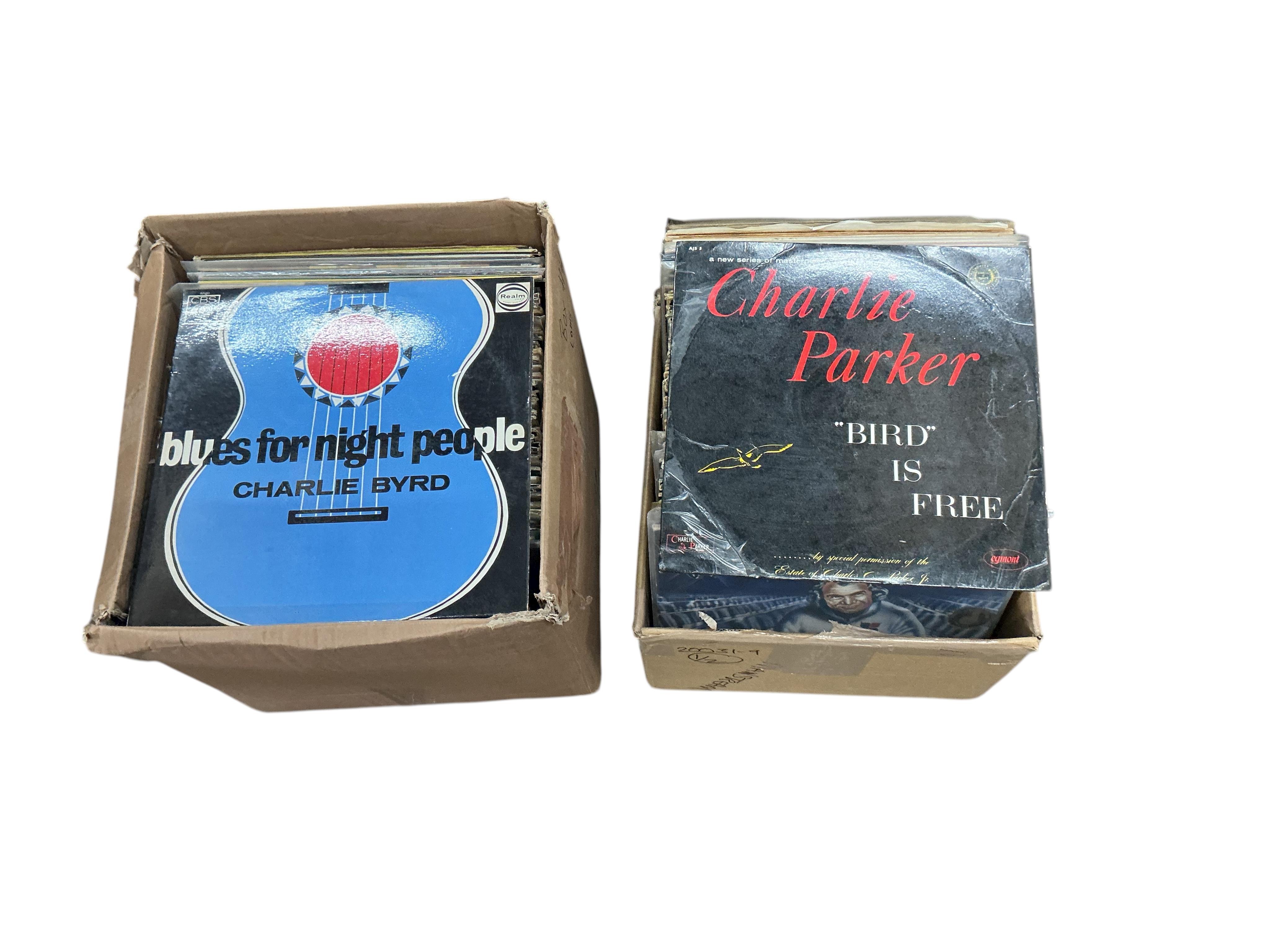 Two boxes of jazz LP record albums, artists including; Charlie Parker, Benny Goodman, Shirley Scott, Dave Brubeck, Buddy Rich, Maynard Ferguson, Georgie Fame, Duke Ellington, Herb Geller, Ida Cox, etc.